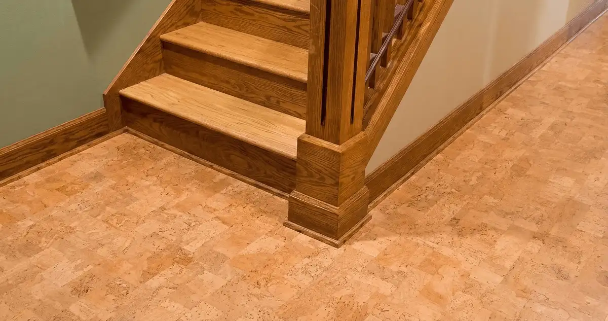 End of a staircase with cork flooring in Albany, NY