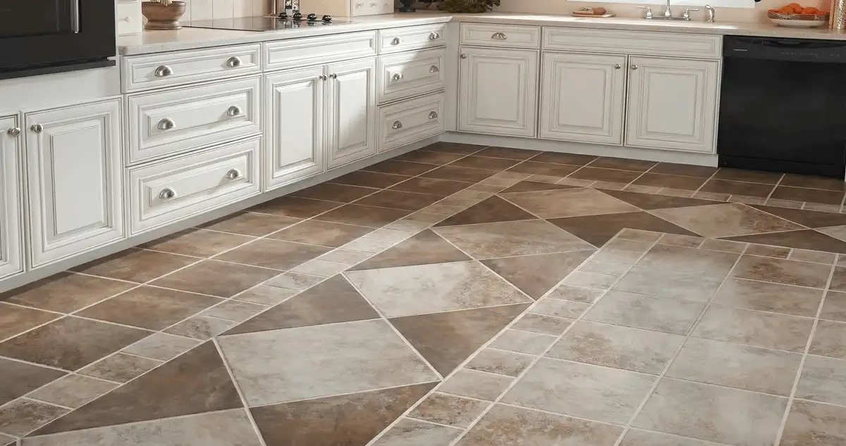 Kitchen with white cabinets and a professionally installed tile floor in Albany, NY