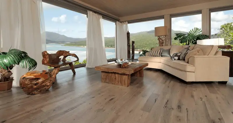 Professionally installed vinyl flooring in a modern living room with large windows in Albany, NY