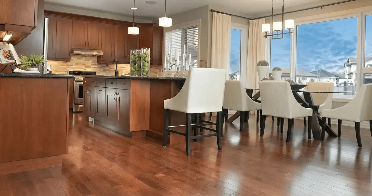 A modern kitchen with professionally installed wood flooring in Albany, NY